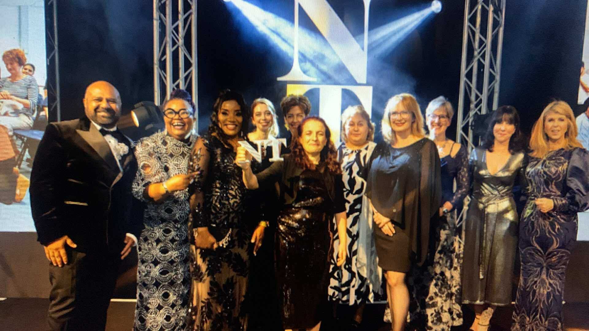 Team photo with NT award